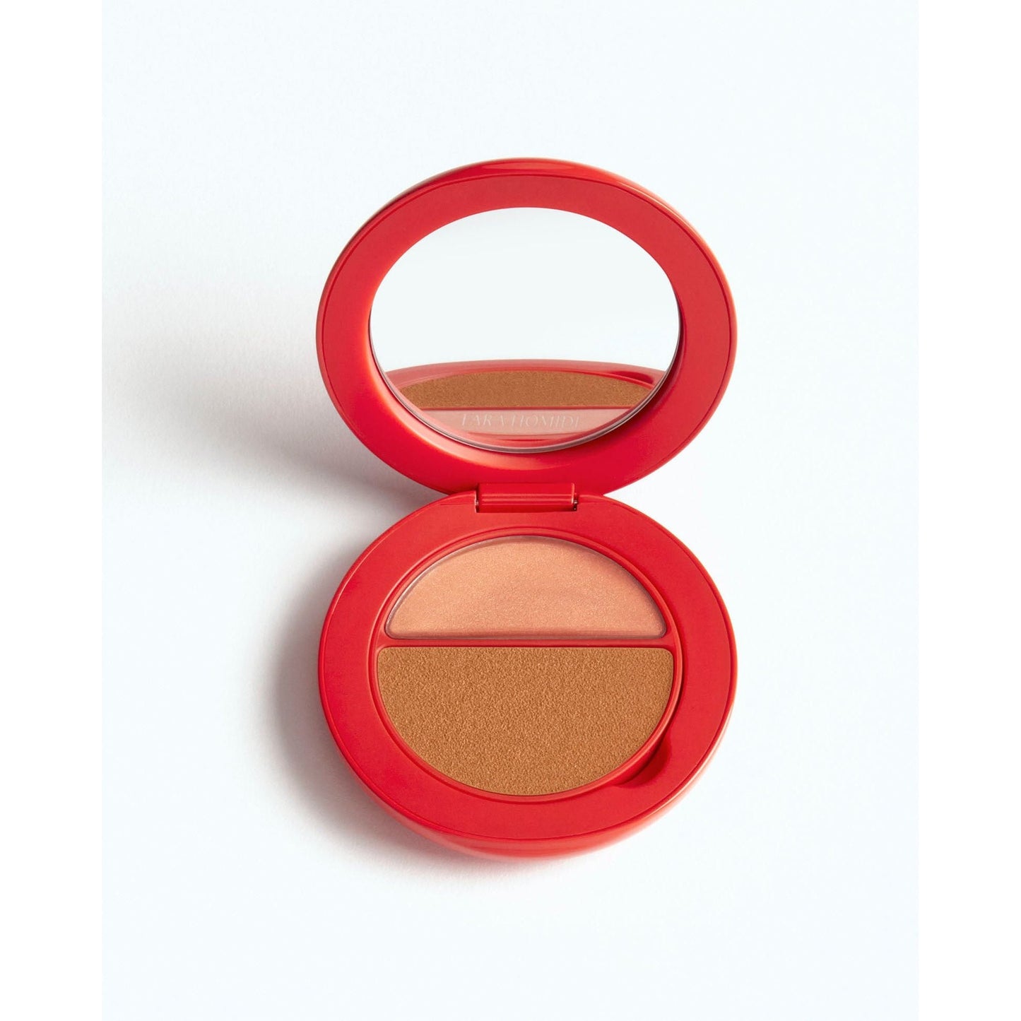 Compact makeup palette with mirror and two shades of blush.
