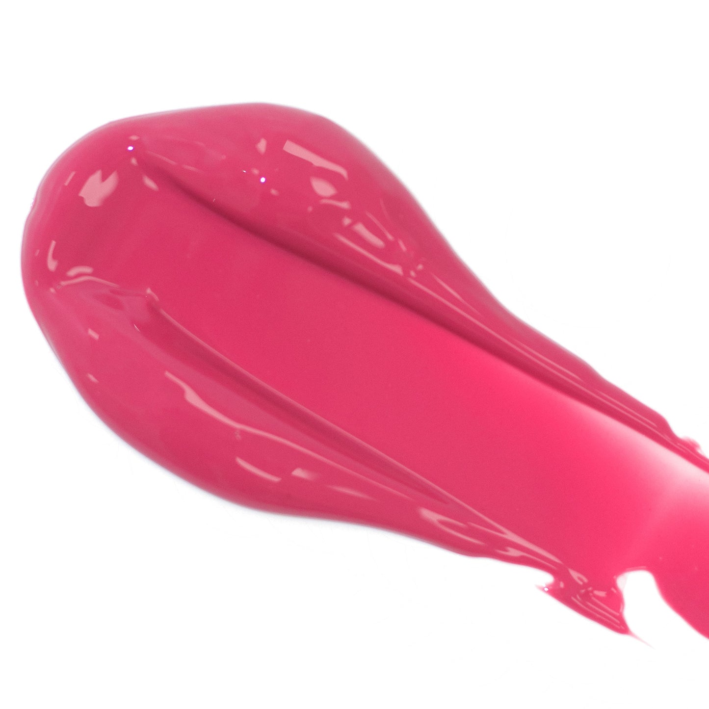 A vibrant Fitglow Beauty Lip Color Serum smear, enriched with organic pomegranate, on a white background.