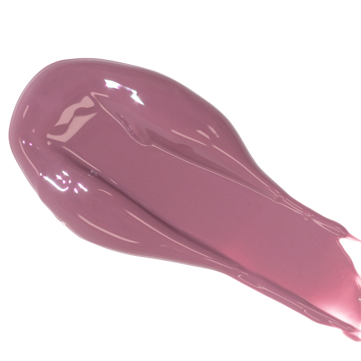 A smear of glossy pink lip gloss on a white background.