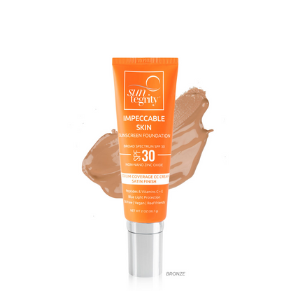 Tube of tinted sunscreen with a swatch of the product beside it.